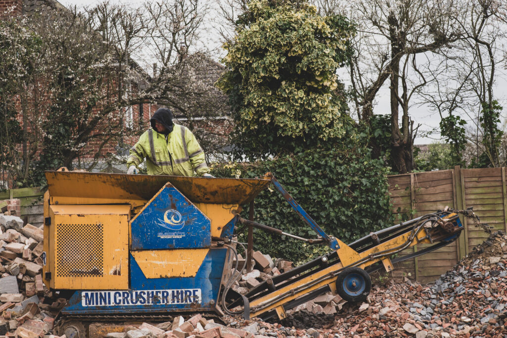 An AJT Contracting and Groundworks Company in Norwich produce aggregate being produced at a building site - Construction Photography from Blanc Creative