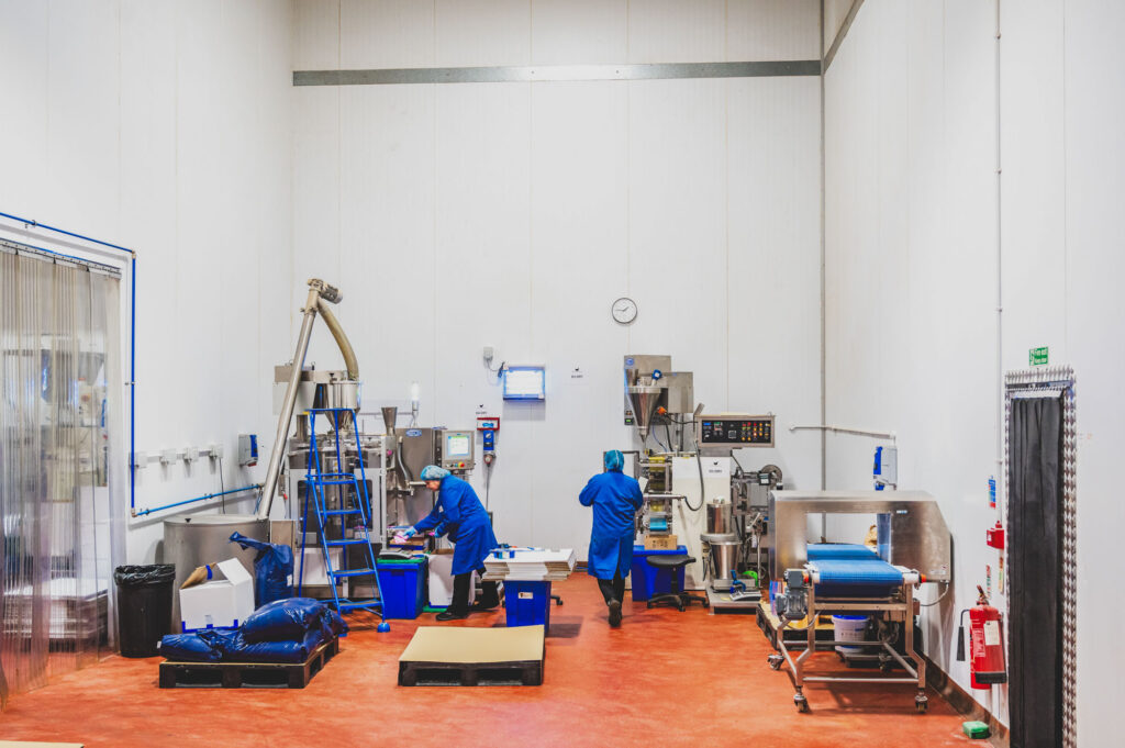 An interior image of rubs and spices being packed by Camstar Ingredients. Manufacturing Photography Norwich.