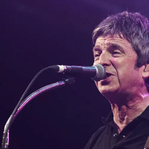 Blanc Creative Commercial Photography Norwich A close up image of Noel Gallagher singing on stage as the headline act at Sheffield Rock N Roll Circus 2023