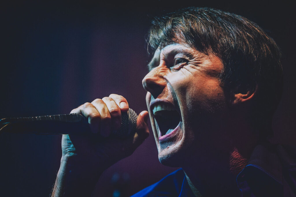 Bland Creative Music Photography at London Roundhouse photographing Suede in concert with Brett Anderson