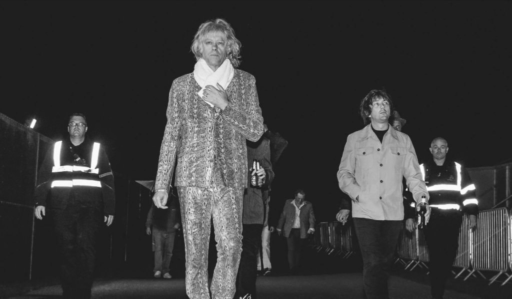 Bob Geldof walking to stage from his dressing room with The Boomtown Rats - P{photography Lee Blanchflower, Blanc Creative Norwich