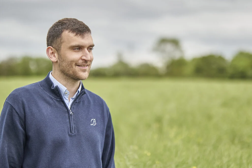 Male professional outdoor portrait, agricultural landscape, natural light — environmental business portrait photography Norfolk by Blanc Creative