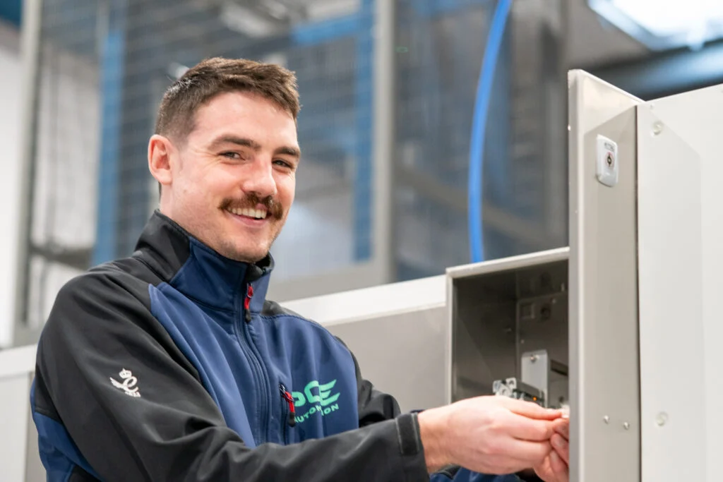 Blanc Creative Commercial Photography Norwich A male engineer working in a modern factory environment wearing branded uniform - Recruitment Photography Norwich by Blanc Creative