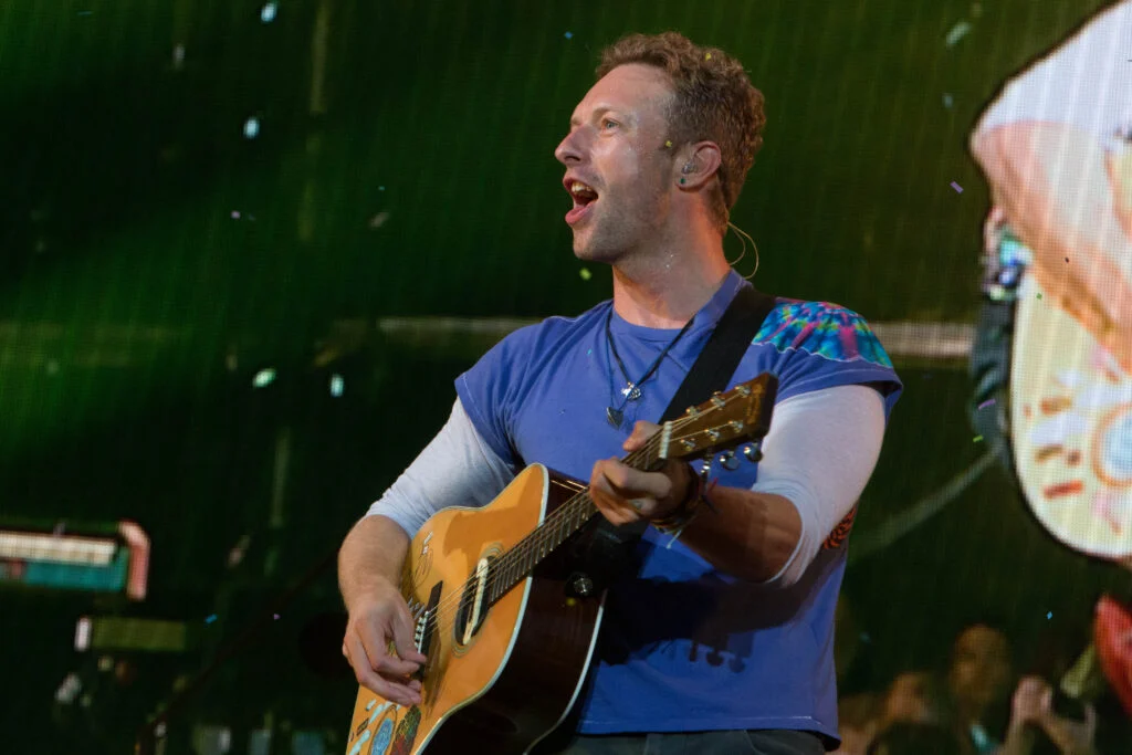 Who Owns Your Concert Photos. Chris Martin and Coldplay on stage heading Radio1 Big Weekend. Norfolk Music Photography from Blanc Creative