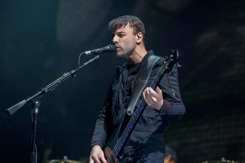 Muse bassist Chris Wolstenholme at the microphone, Radio 1 Big Weekend Norwich 2015
