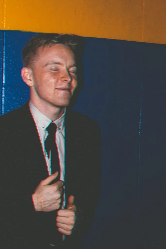 Blanc Creative Commercial Photography Norwich A badly composed cheap business headshot of a young male in a suit