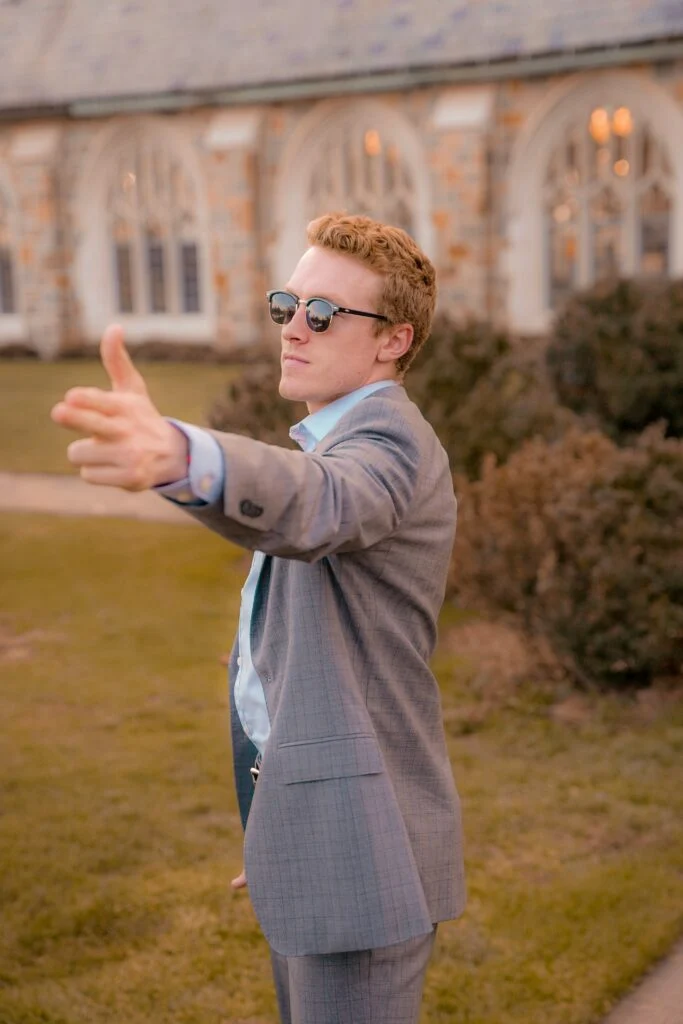 Blanc Creative Commercial Photography Norwich A badly posed cheap headshot of a male in a formal jacket with a church in the background
