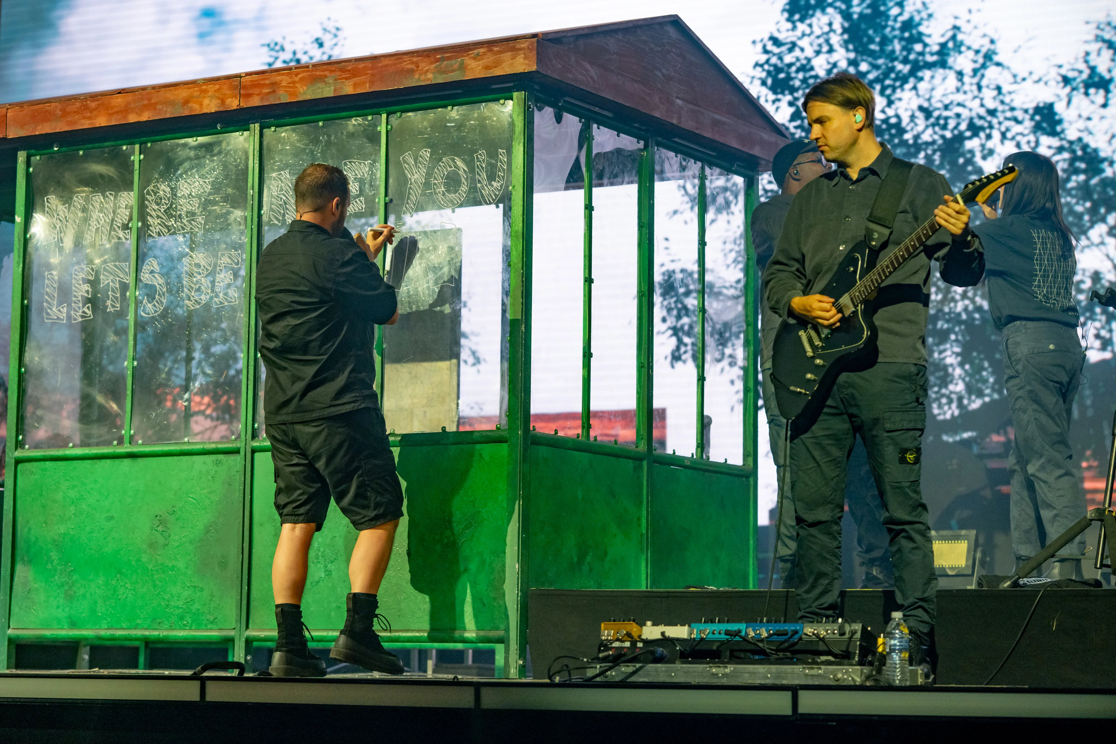 The Streets frontman Mike Skinner performing beside the bus shelter stage set at Rock N Roll Circus, Earlham Park, Norwich