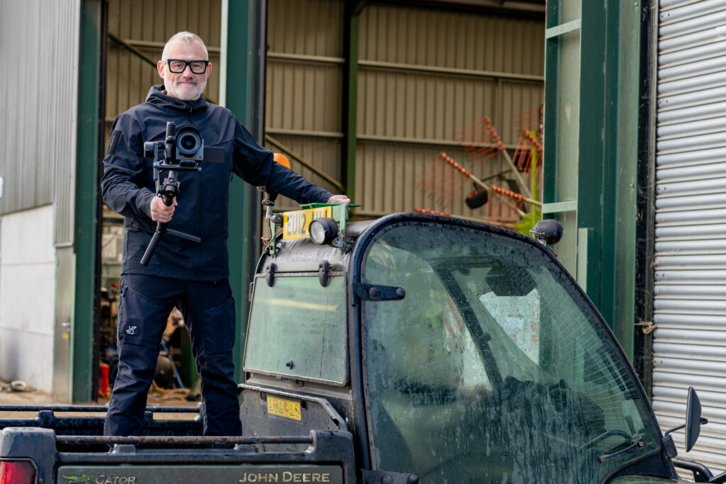 Blanc Creative Commercial Photography Norwich Video Production for Businesses from Blanc Creative. Lee Blanchflower, founder of Blanc Creative with a video camera behind the scenes.